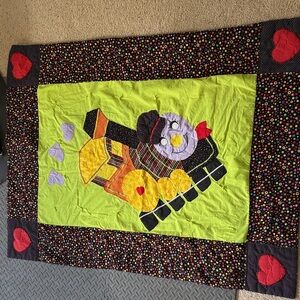 Playful Train-Themed Quilt with Vibrant Accents